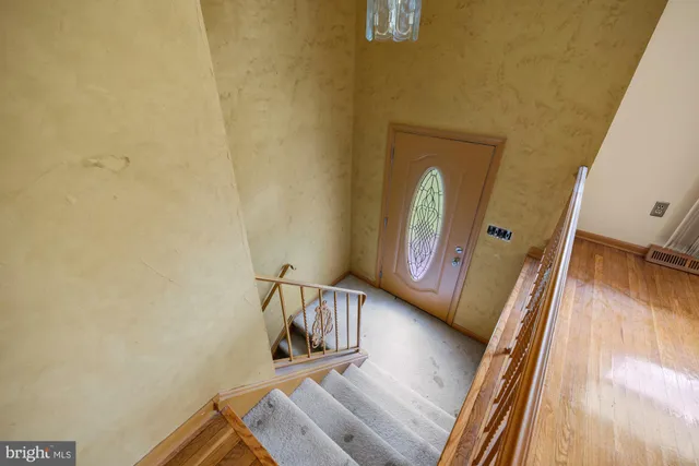 a view of a living room with a bed
