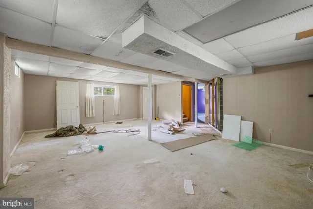 a view of a room with painted walls