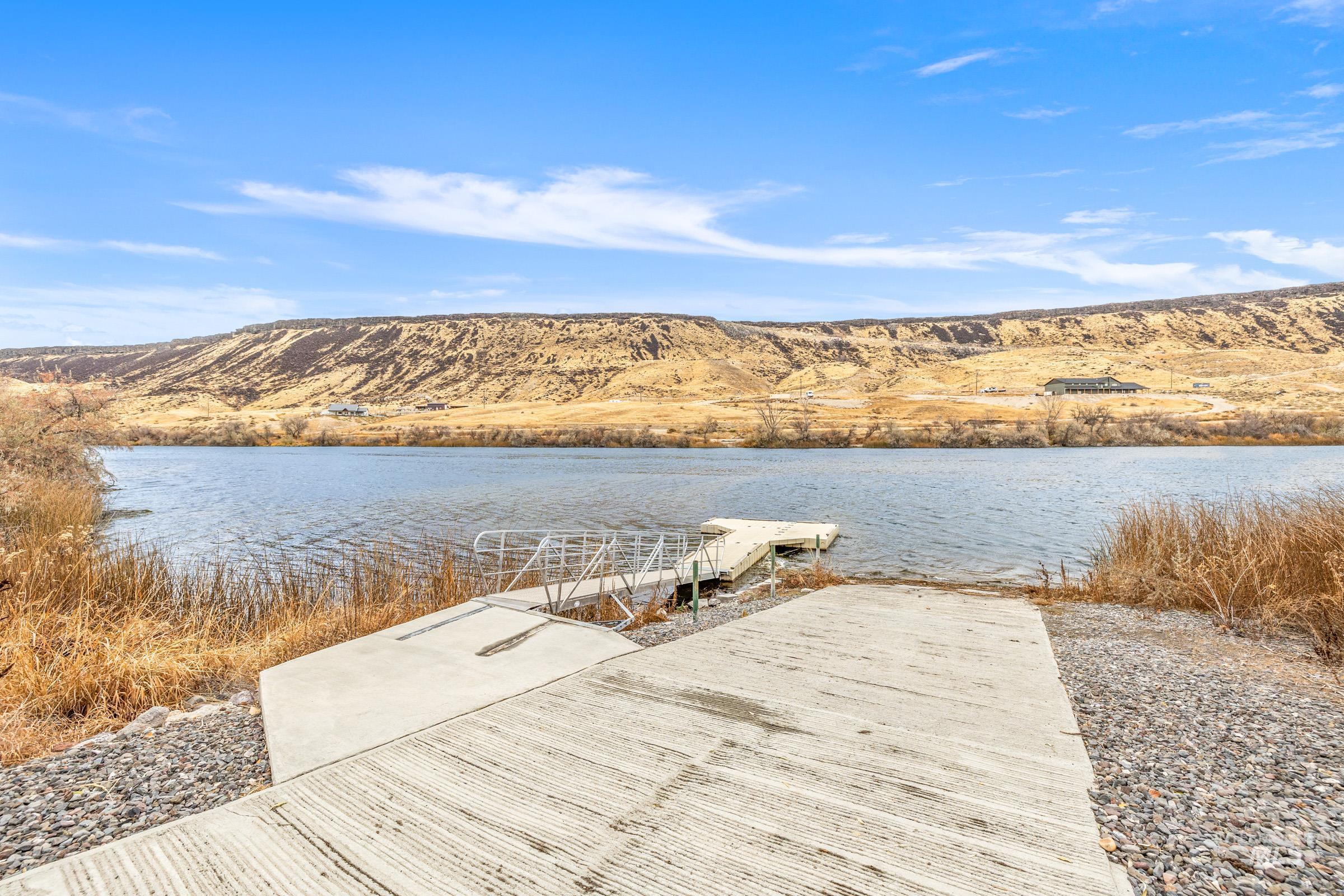 10514 Airpark Loop Road Melba, ID 83641 - Photo 43 of 47 Dock featuring a water and mountain view