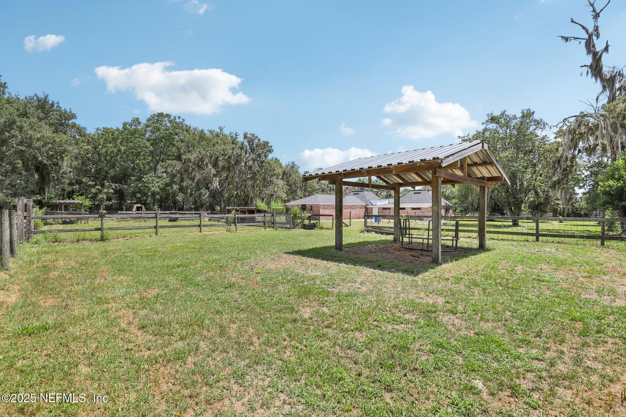 3992 Hidden Acre Road Middleburg, FL 32068 - Photo 43 of 74 Left Field Covered Feeding Area
