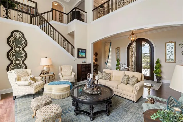a view of a dining room with furniture and window