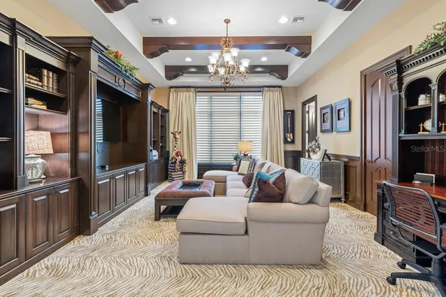 a bathroom with a granite countertop toilet sink and mirror
