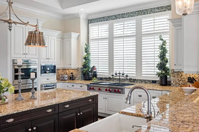 a living room with furniture a window and a piano