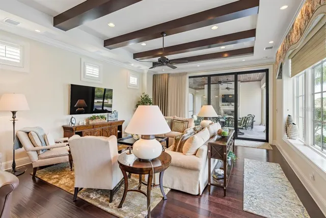 a bathroom with a granite countertop toilet sink and mirror