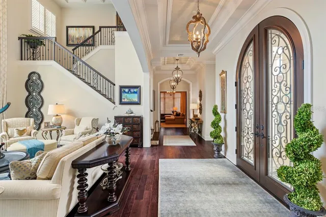 a bathroom with a granite countertop sink a toilet and mirror