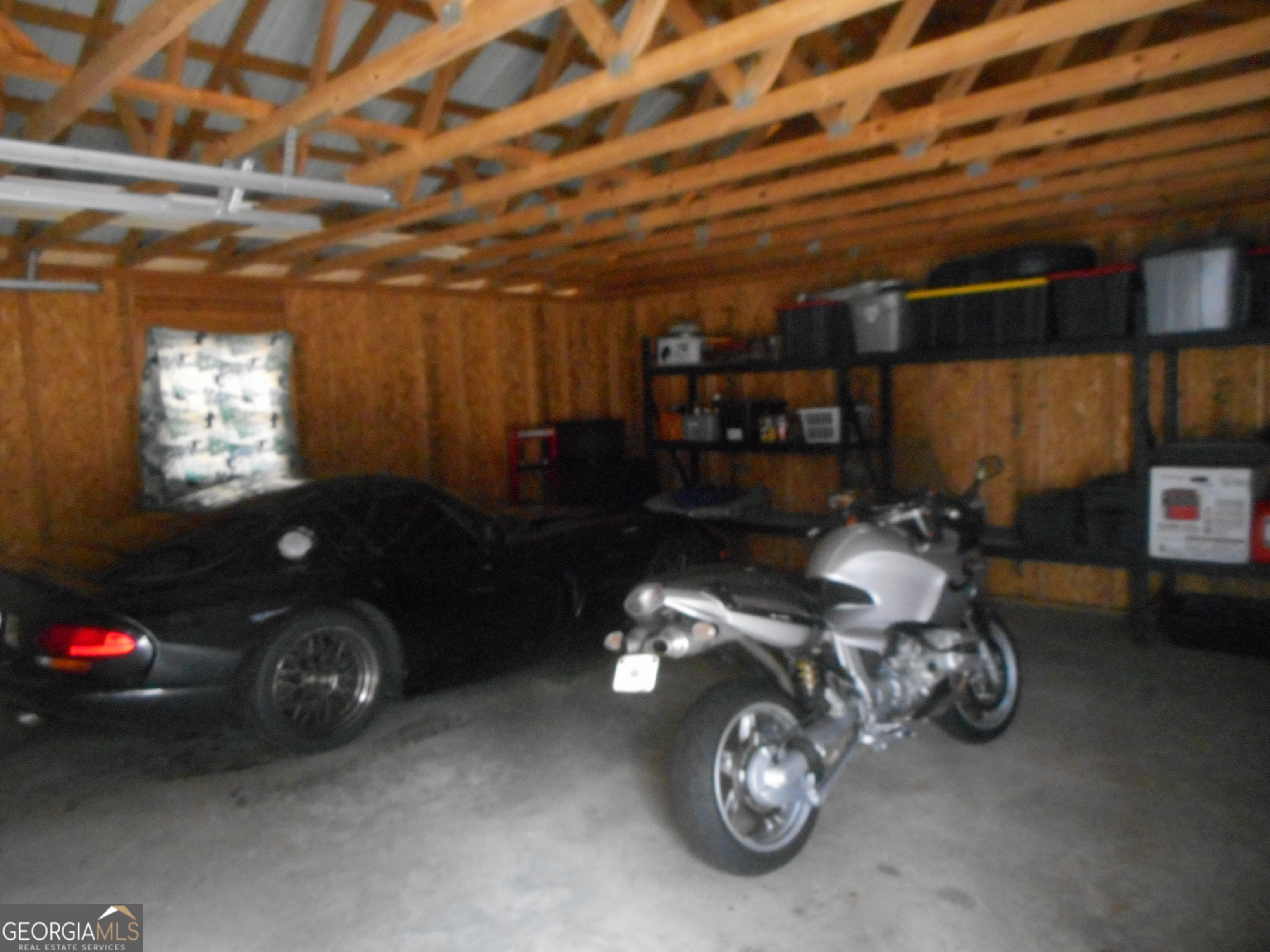 530 Grandview Avenue Mount Airy, GA 30563 - Photo 17 of 20 a car parked in a garage
