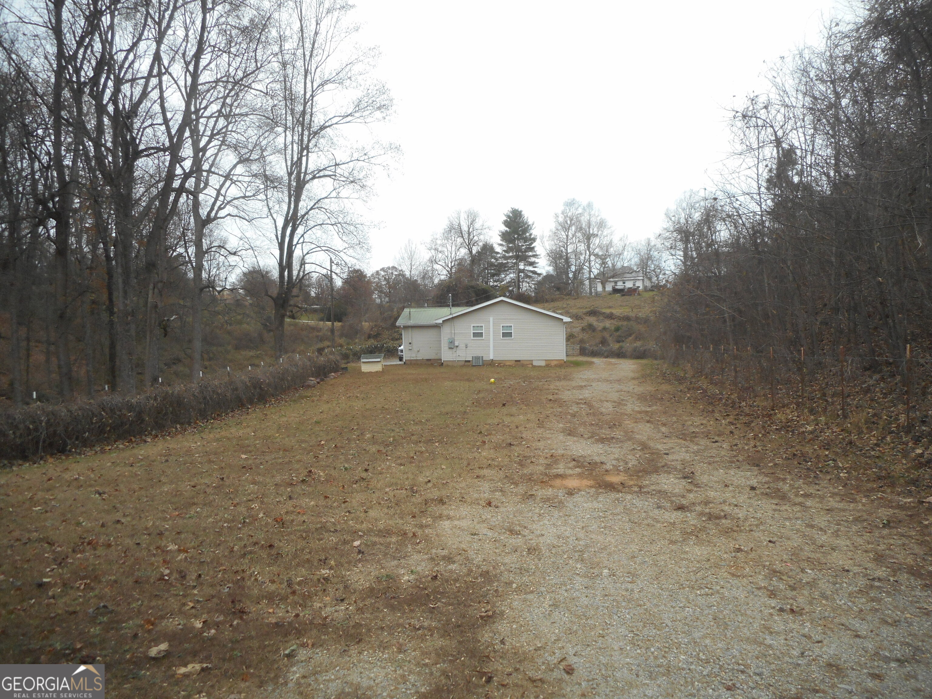 530 Grandview Avenue Mount Airy, GA 30563 - Photo 20 of 20 a view of a dry yard with trees