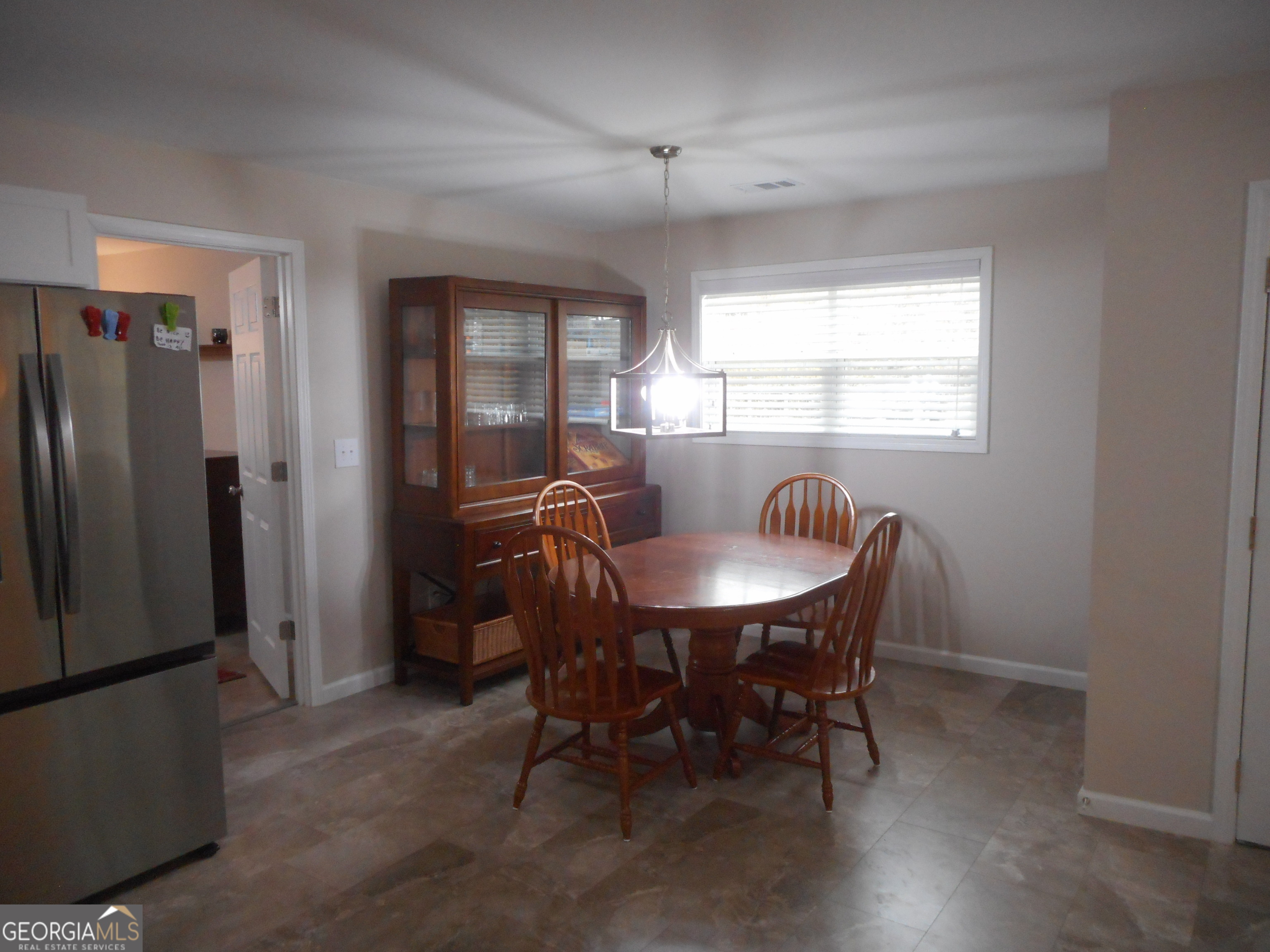 530 Grandview Avenue Mount Airy, GA 30563 - Photo 8 of 20 a dining room with furniture and window