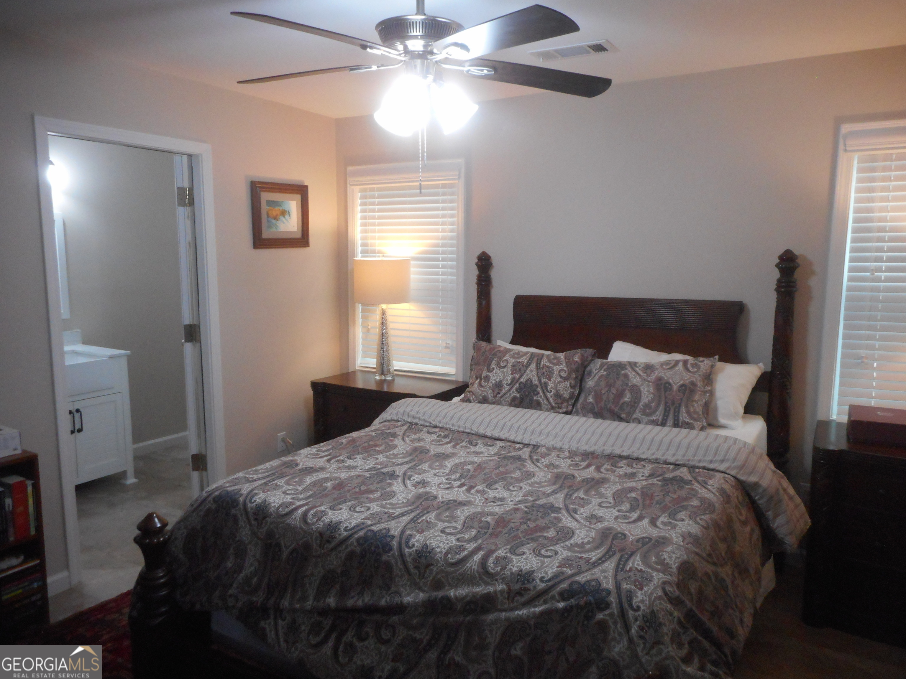 530 Grandview Avenue Mount Airy, GA 30563 - Photo 9 of 20 a bedroom with a bed and a window