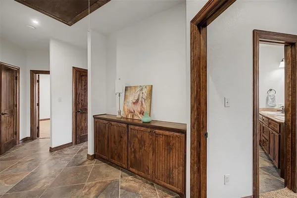 a view of a bedroom with furniture and wardrobe