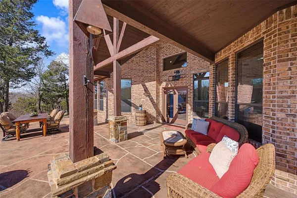 a view of balcony with patio