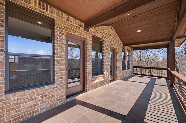 a balcony with chairs