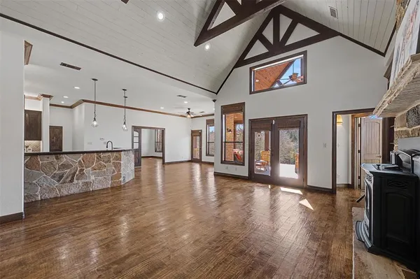 a view of an entryway with wooden floor