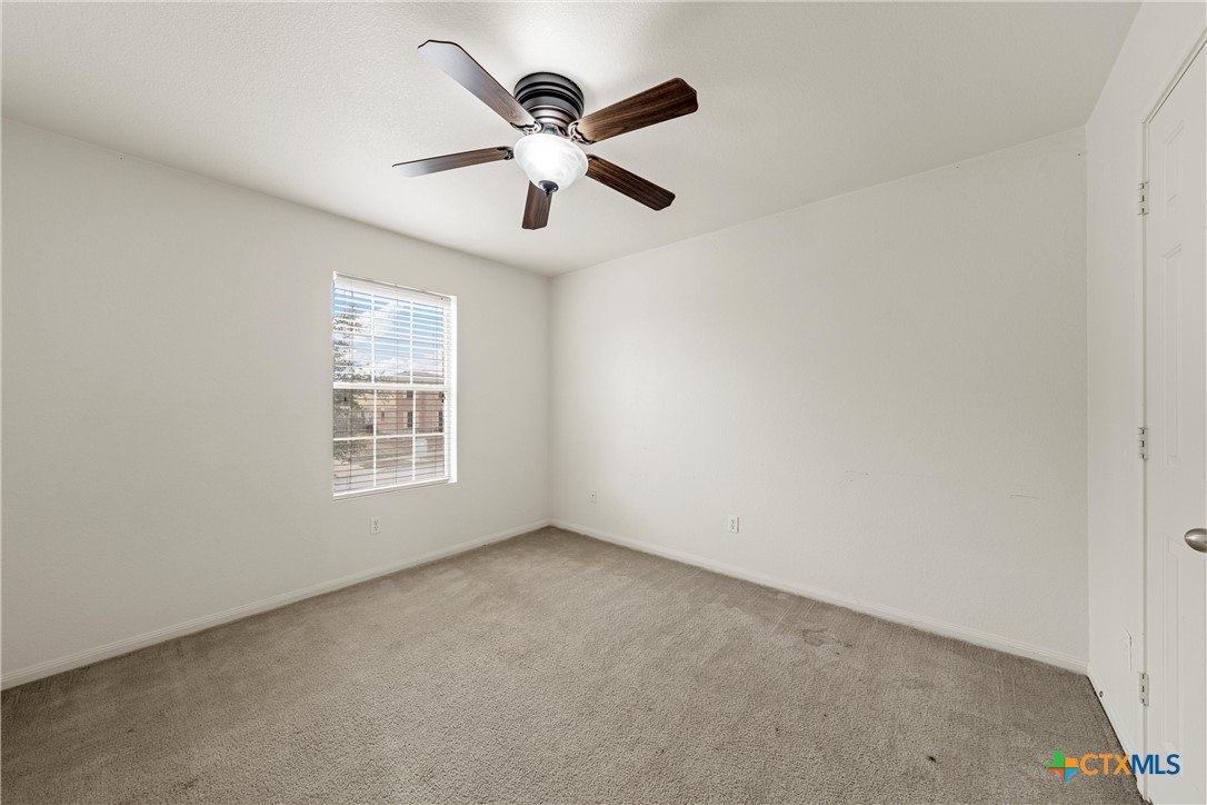 2209 Riley Drive Killeen, TX 76542 - Photo 23 of 33 an empty room with a window and a fan