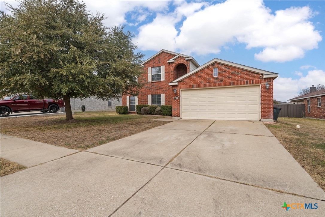 2209 Riley Drive Killeen, TX 76542 - Photo 4 of 33 a front view of a house with a yard