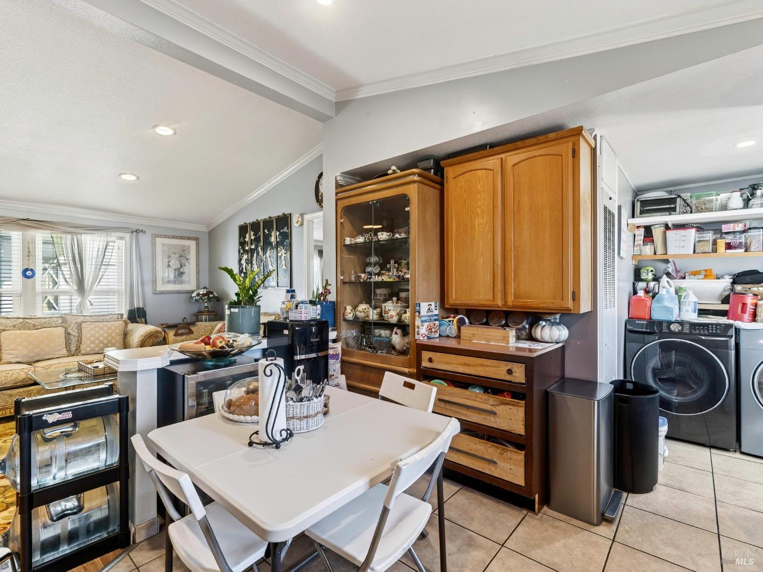 2963 Santa Rosa Avenue, Unit C6 Santa Rosa, CA 95407 - Photo 14 of 35 a view of a dining room with furniture and a window