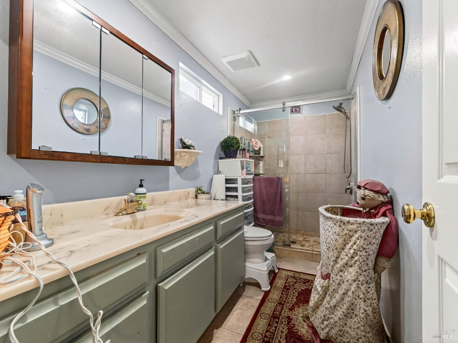 2963 Santa Rosa Avenue, Unit C6 Santa Rosa, CA 95407 - Photo 27 of 35 a bathroom with a sink and a mirror