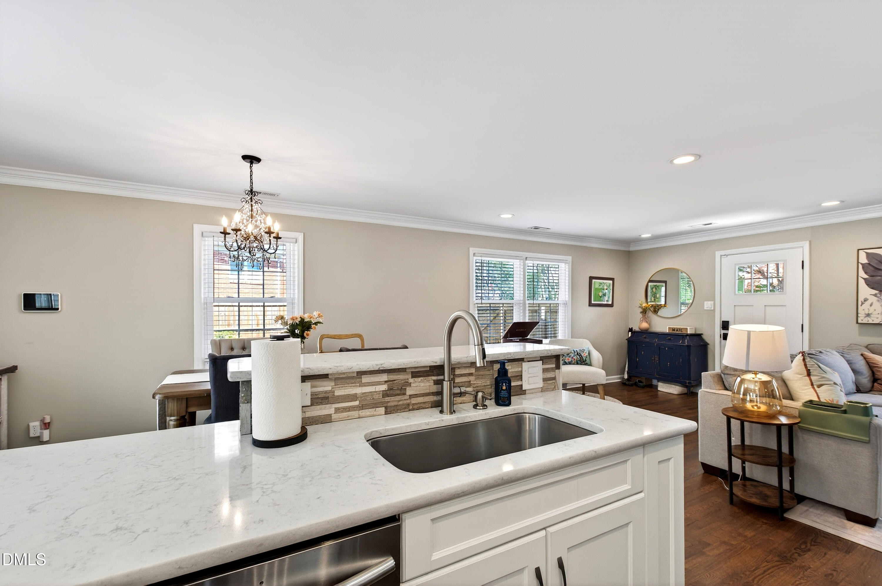 605 Chatham Lane Raleigh, NC 27610 - Photo 10 of 40 a kitchen with a sink and refrigerator