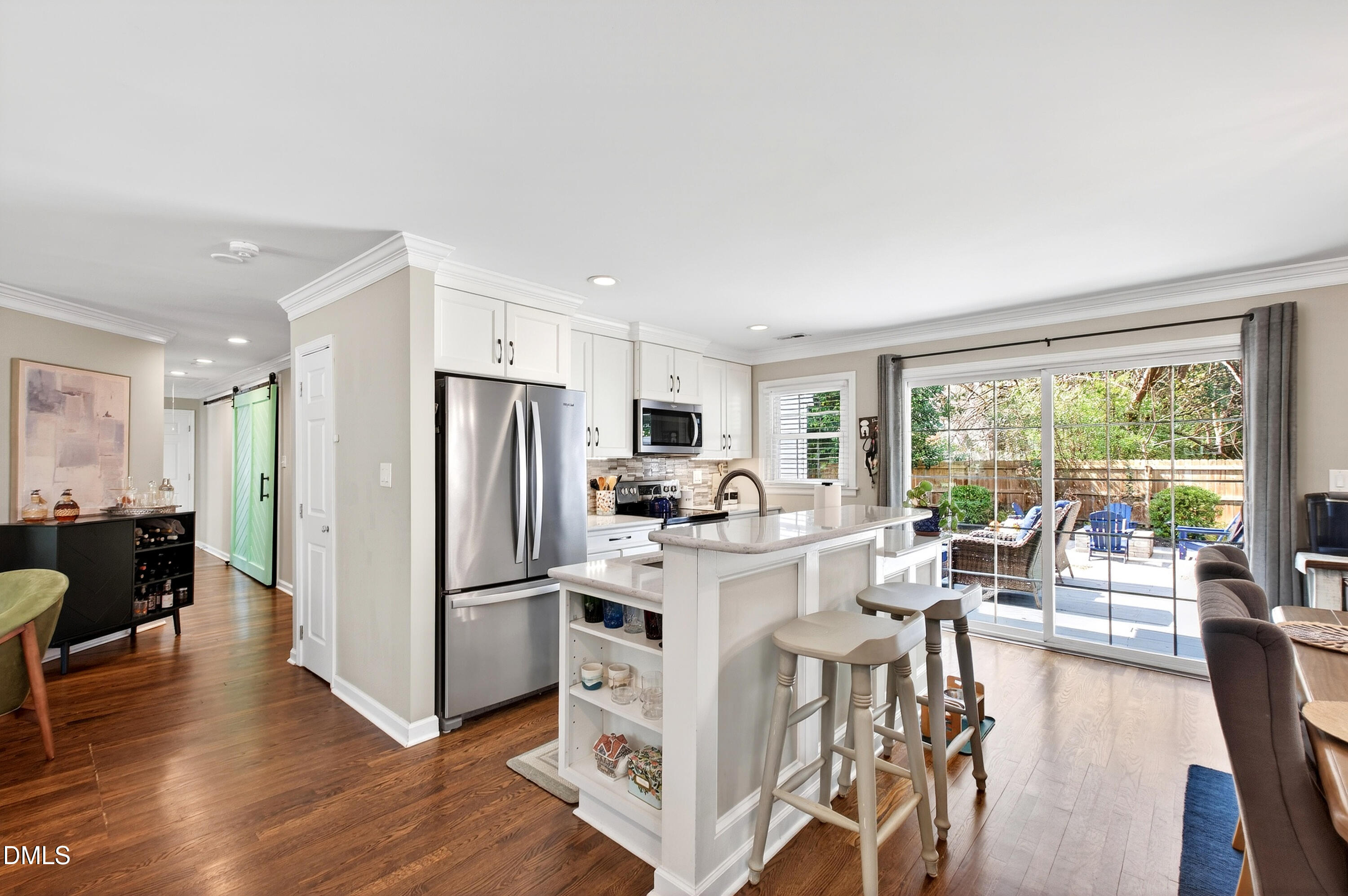 605 Chatham Lane Raleigh, NC 27610 - Photo 12 of 40 a view of a kitchen with dining table and chairs