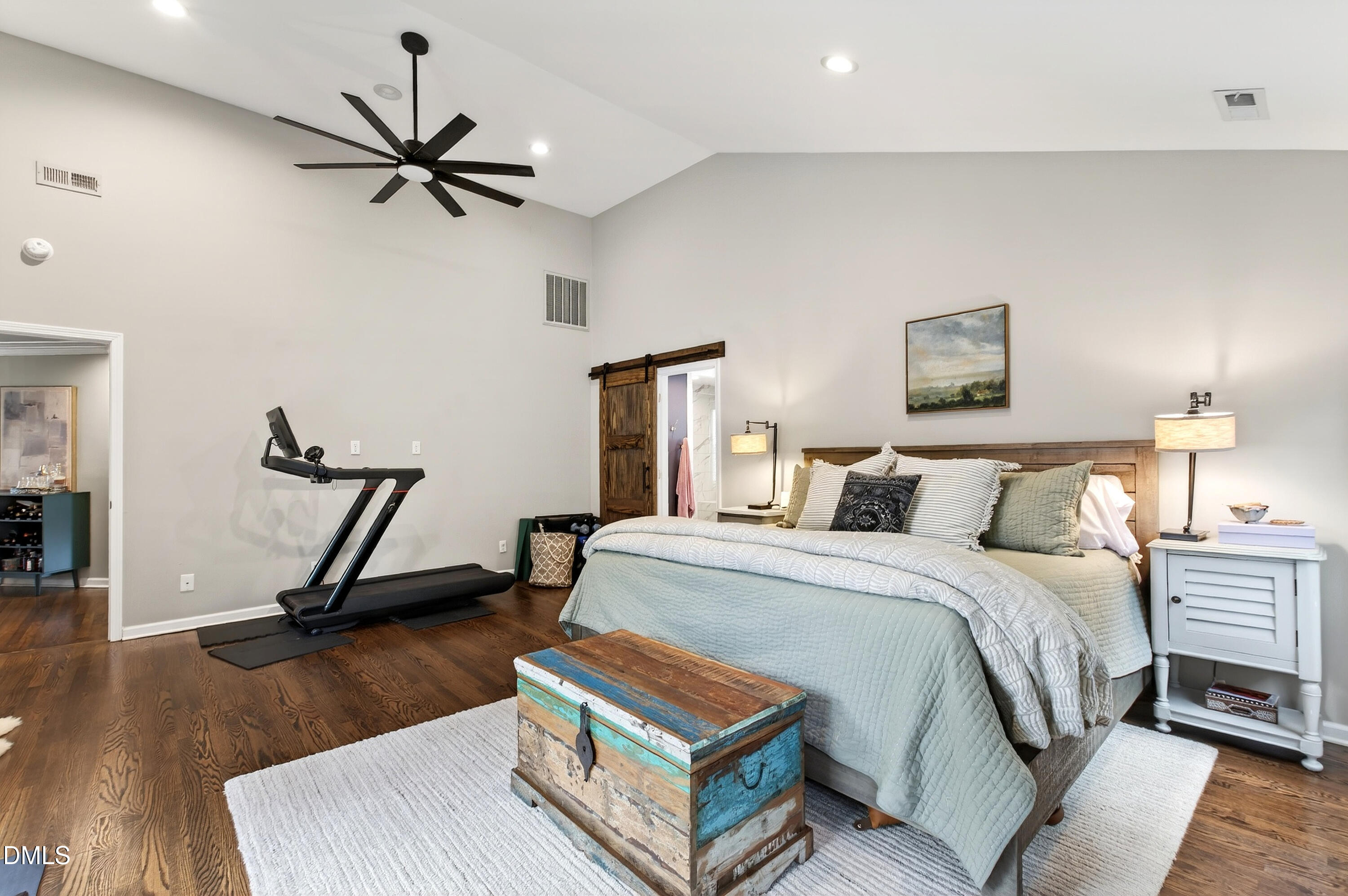 605 Chatham Lane Raleigh, NC 27610 - Photo 18 of 40 a bed room with a bed and a chandelier