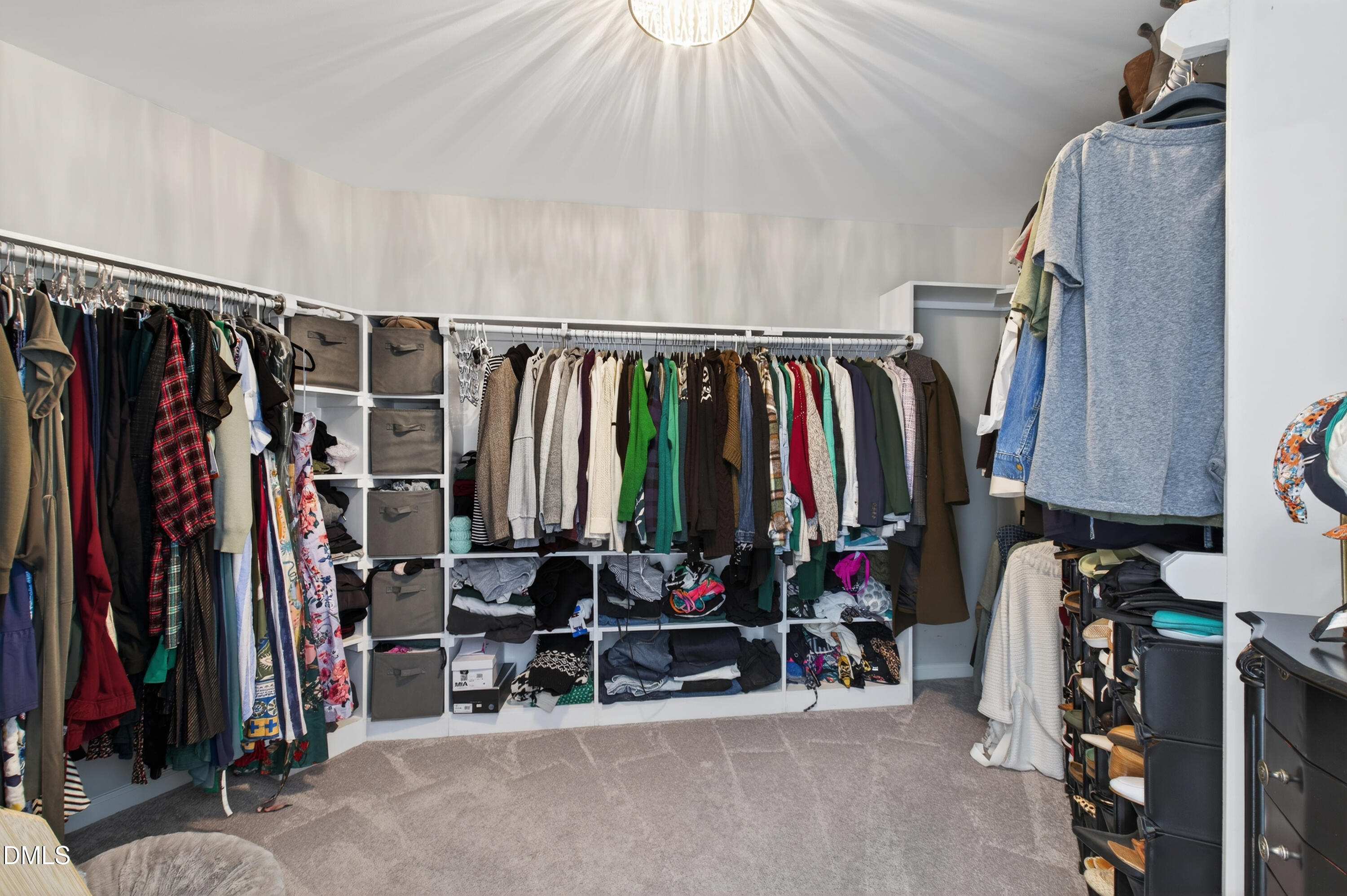 605 Chatham Lane Raleigh, NC 27610 - Photo 24 of 40 a view of walk in closet with clothes
