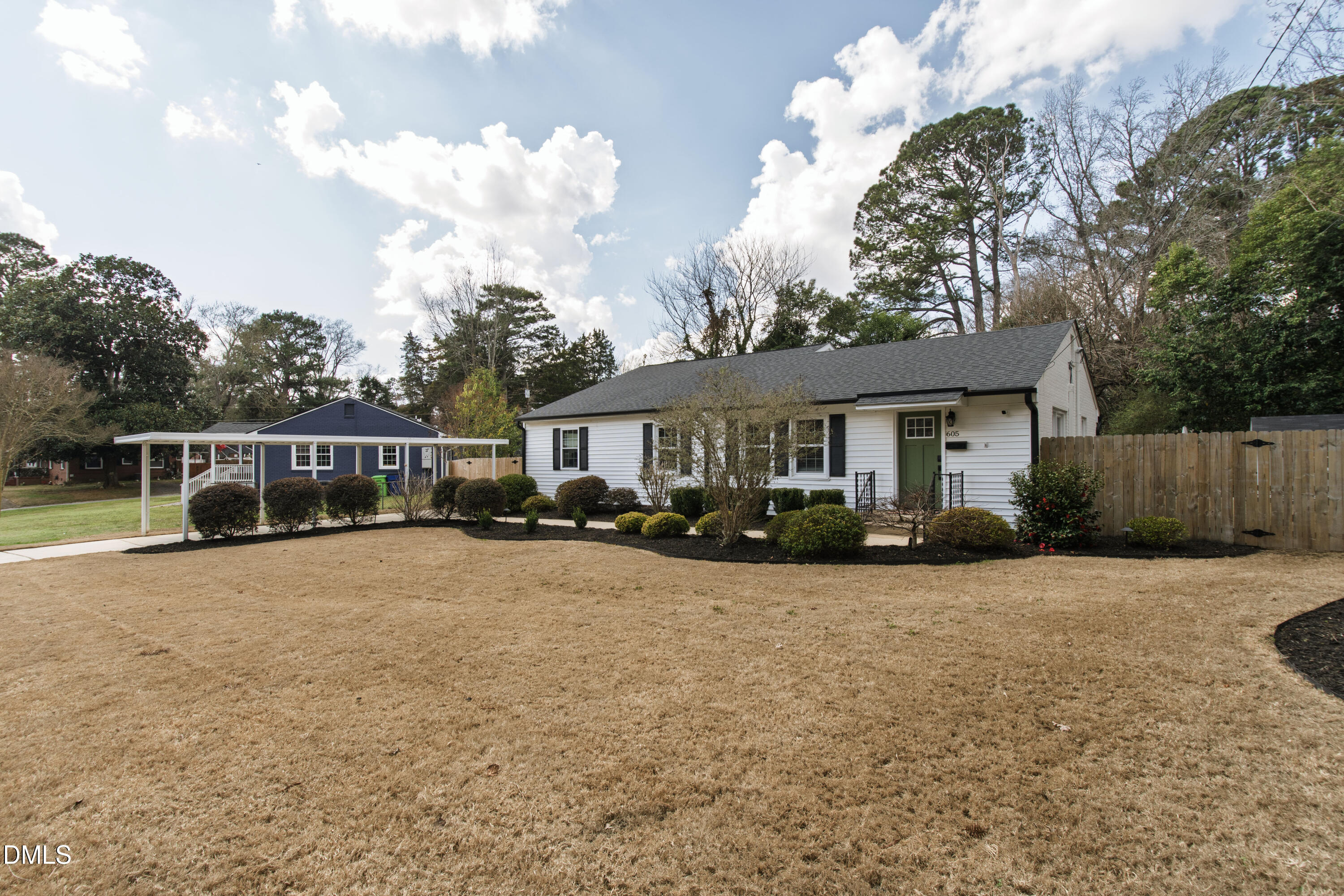 605 Chatham Lane Raleigh, NC 27610 - Photo 39 of 40 a front view of a house with yard porch and seating space