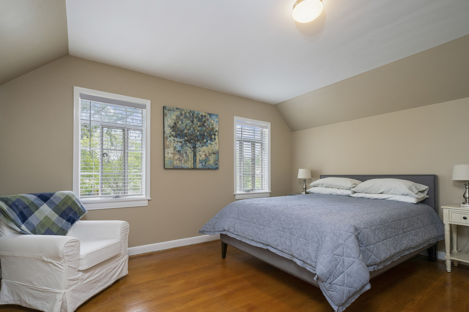 600 East Parkway Road Riverside, IL 60546 - Photo 11 of 29 a bedroom with a bed couch and window