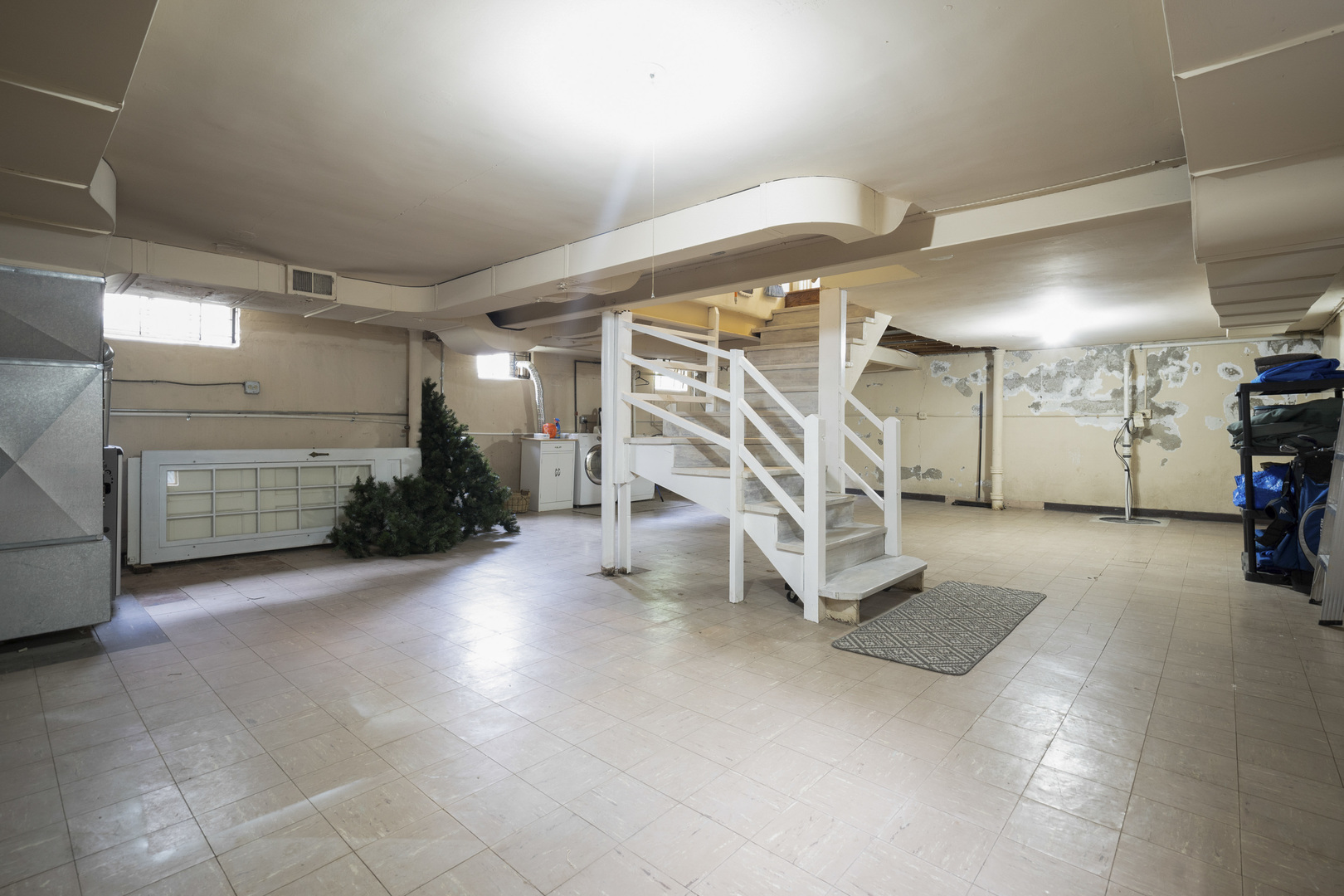 600 East Parkway Road Riverside, IL 60546 - Photo 26 of 29 a view of a livingroom with stairs and a ceiling fan