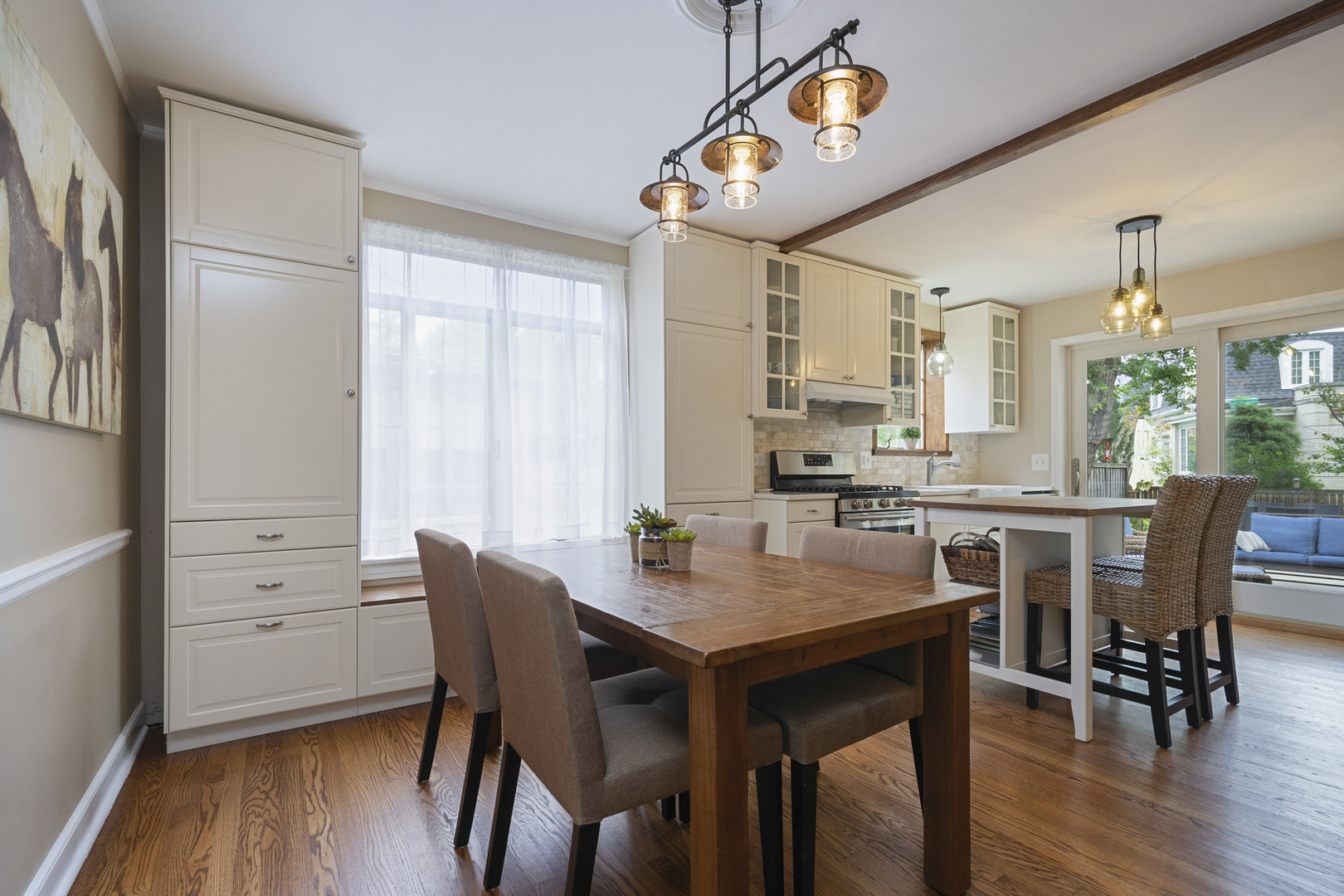 600 East Parkway Road Riverside, IL 60546 - Photo 4 of 29 a dining room with furniture a window and wooden floor