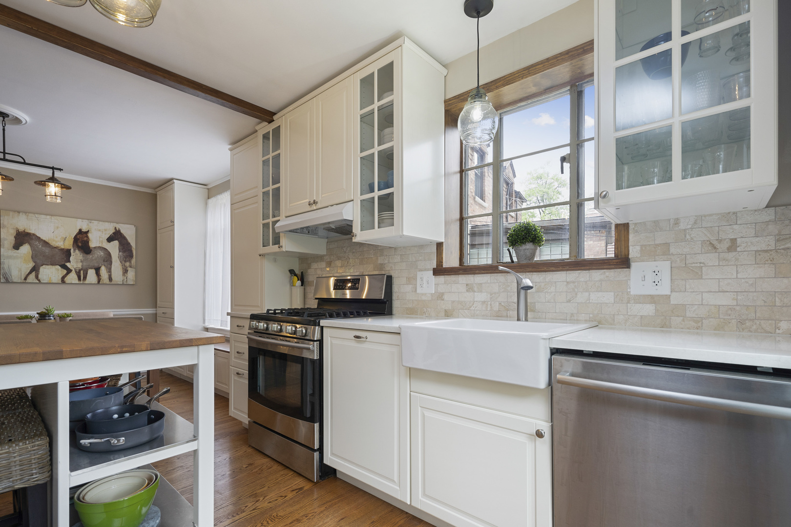 600 East Parkway Road Riverside, IL 60546 - Photo 5 of 29 a kitchen with stainless steel appliances white cabinets and a stove