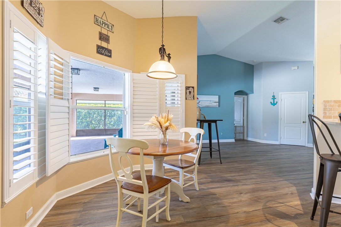 152 35th Square Southwest Vero Beach, FL 32968 - Photo 11 of 35 a dining room with furniture and window
