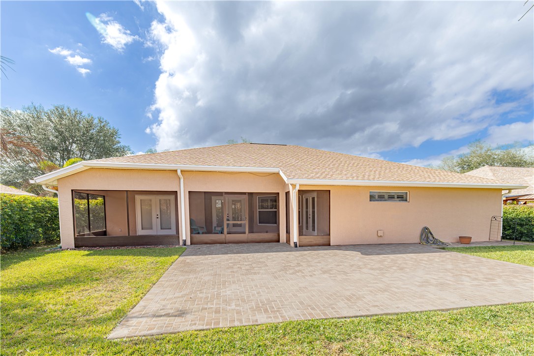 152 35th Square Southwest Vero Beach, FL 32968 - Photo 30 of 35 a view of a house with backyard and porch