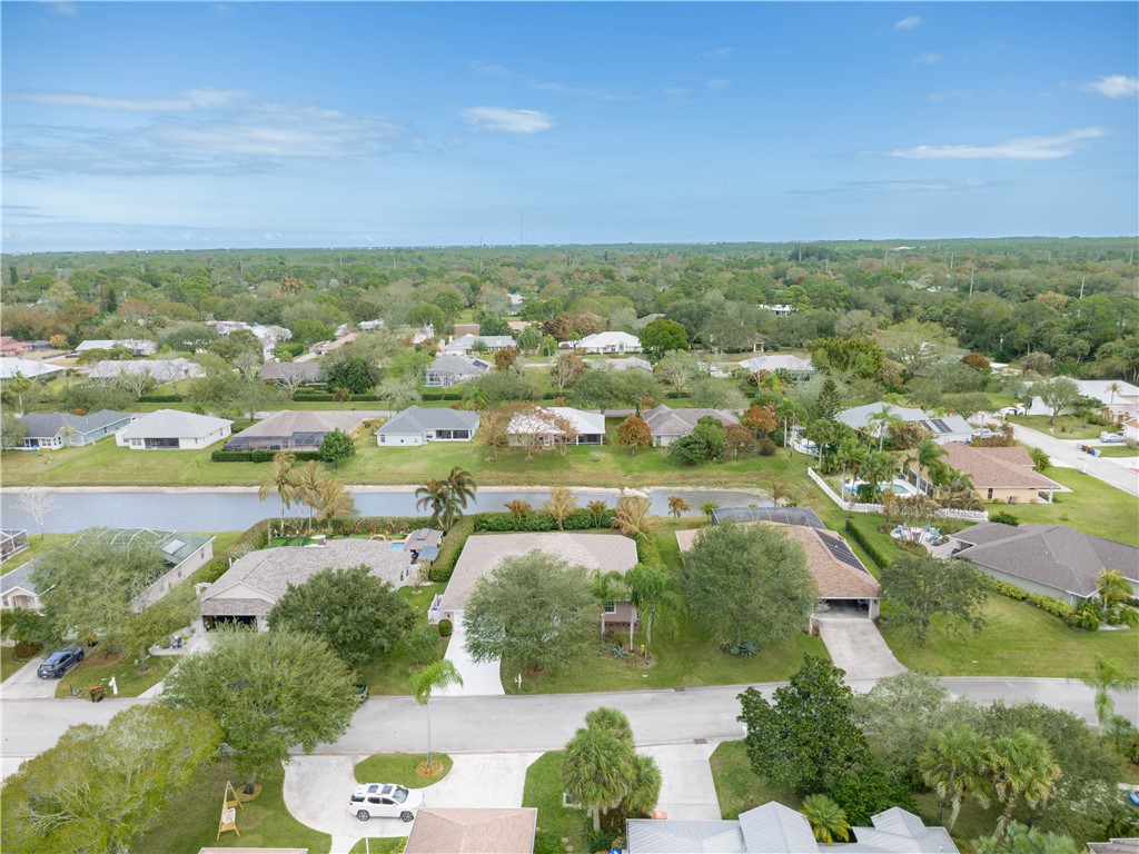 152 35th Square Southwest Vero Beach, FL 32968 - Photo 31 of 35 an aerial view of a city with lots of residential buildings