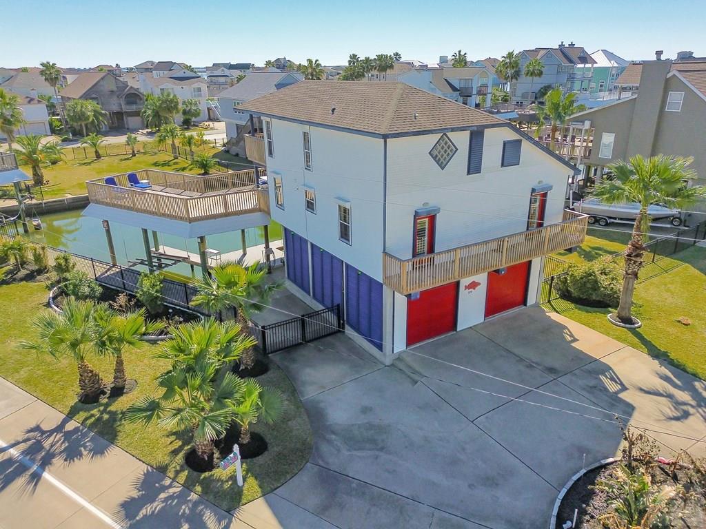 270 Isles End Road Tiki Island, TX 77554 - Photo 2 of 49 an aerial view of a house
