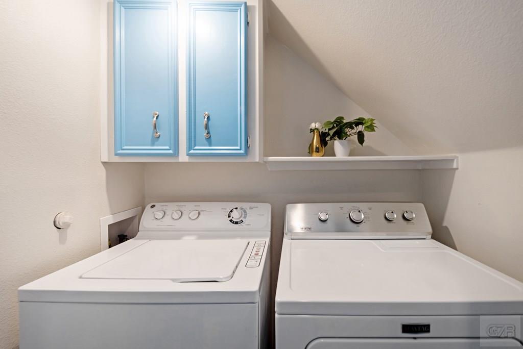 270 Isles End Road Tiki Island, TX 77554 - Photo 23 of 49 a utility room with dryer and washer