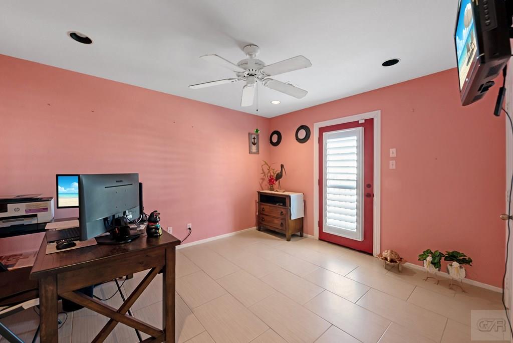 270 Isles End Road Tiki Island, TX 77554 - Photo 24 of 49 a view of a workspace with furniture