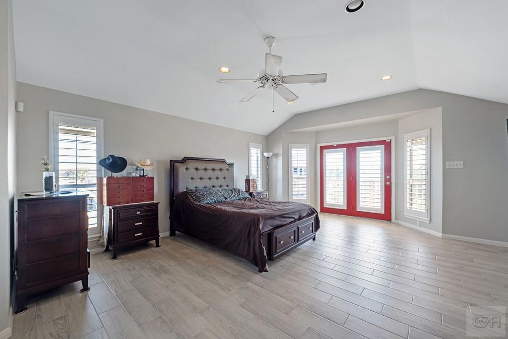 270 Isles End Road Tiki Island, TX 77554 - Photo 27 of 49 a living room with furniture and wooden floor