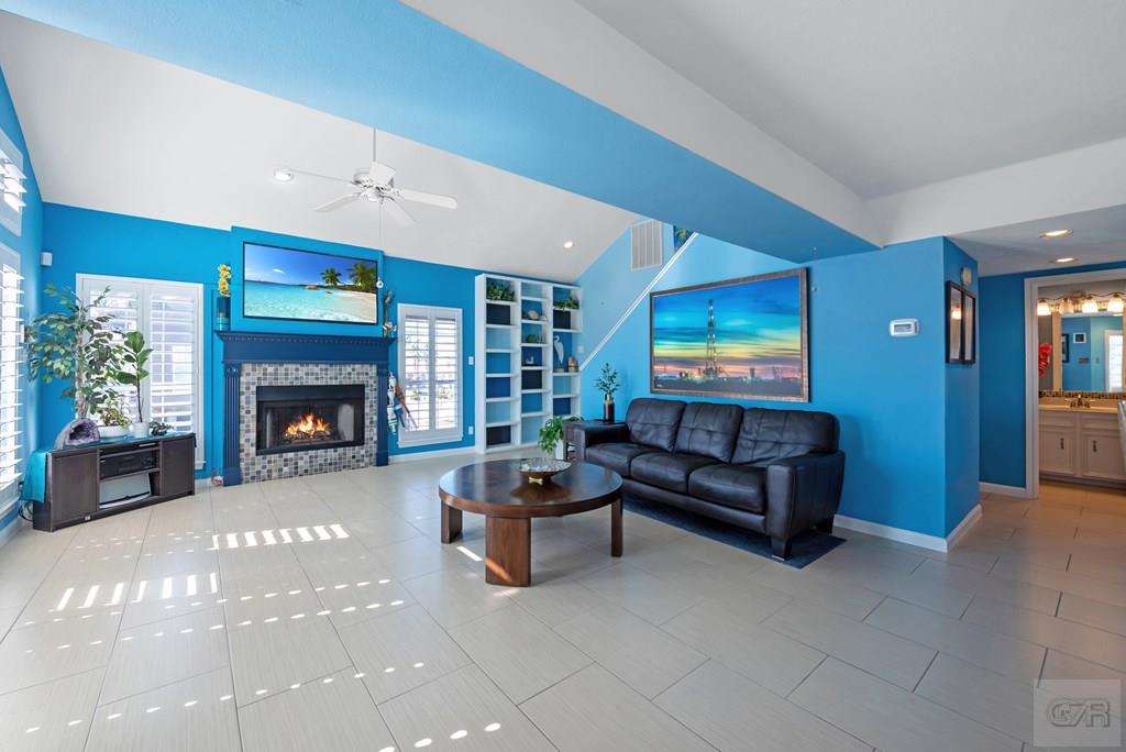 270 Isles End Road Tiki Island, TX 77554 - Photo 7 of 49 a living room with furniture and a fireplace