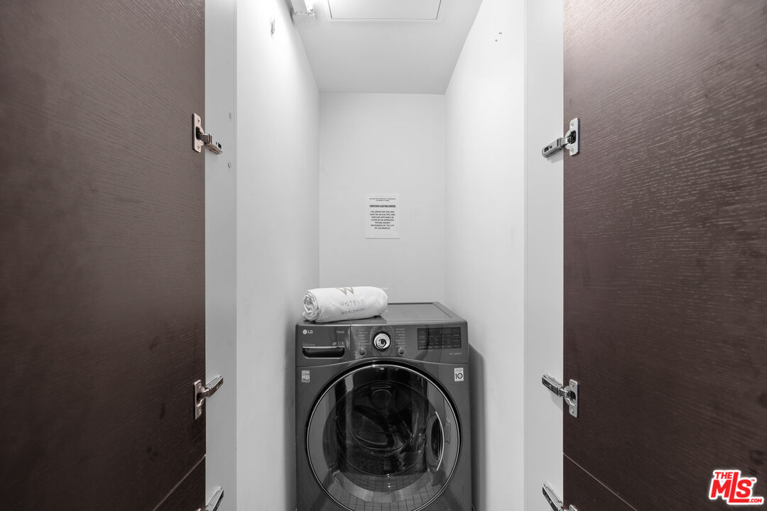 6250 Hollywood Boulevard, Unit 7K Los Angeles, CA 90028 - Photo 31 of 50 a utility room with dryer and washer