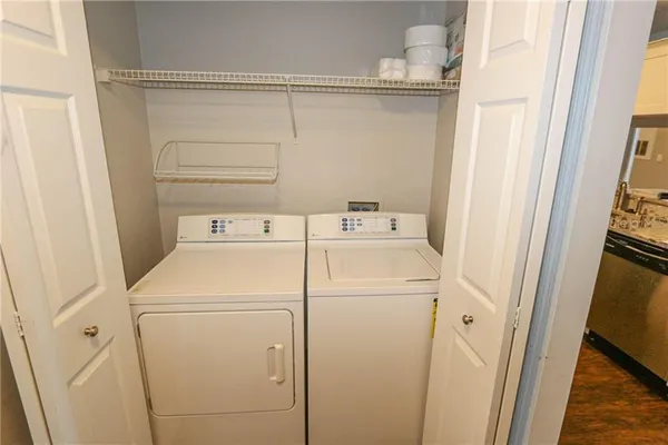 a utility room with dryer and washer