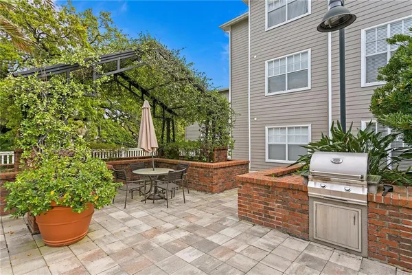 a backyard of a house with seating space