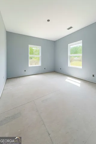 an empty room with a window