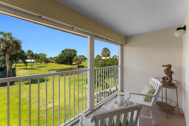 a view of a two chair in the balcony