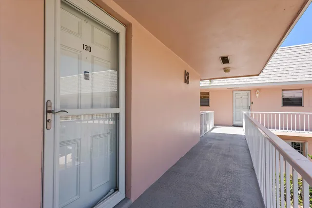 a view of a hallway with closet