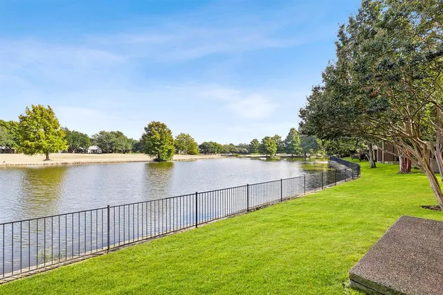 a view of lake with a lake in the background