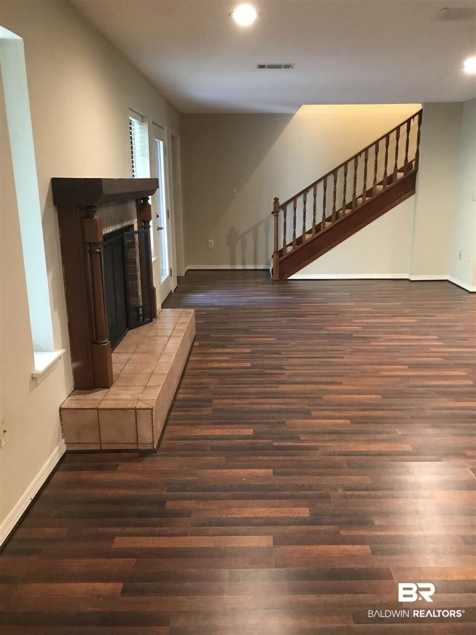8901 Bay View Drive Foley, AL 36535 - Photo 12 of 30 Fireplace and Stairs