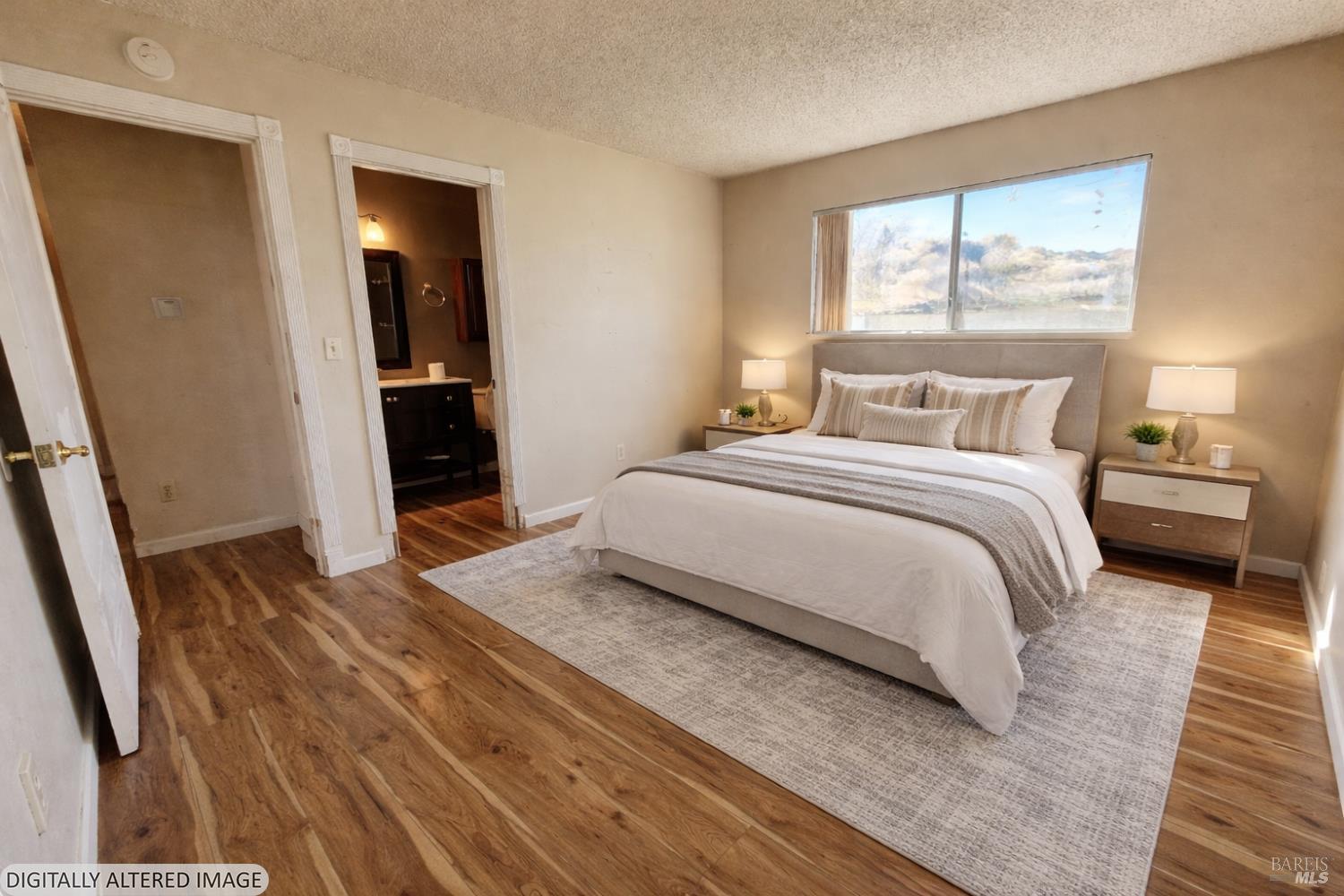 717 Blair Place Santa Rosa, CA 95401 - Photo 11 of 23 a bedroom with a bed and a window