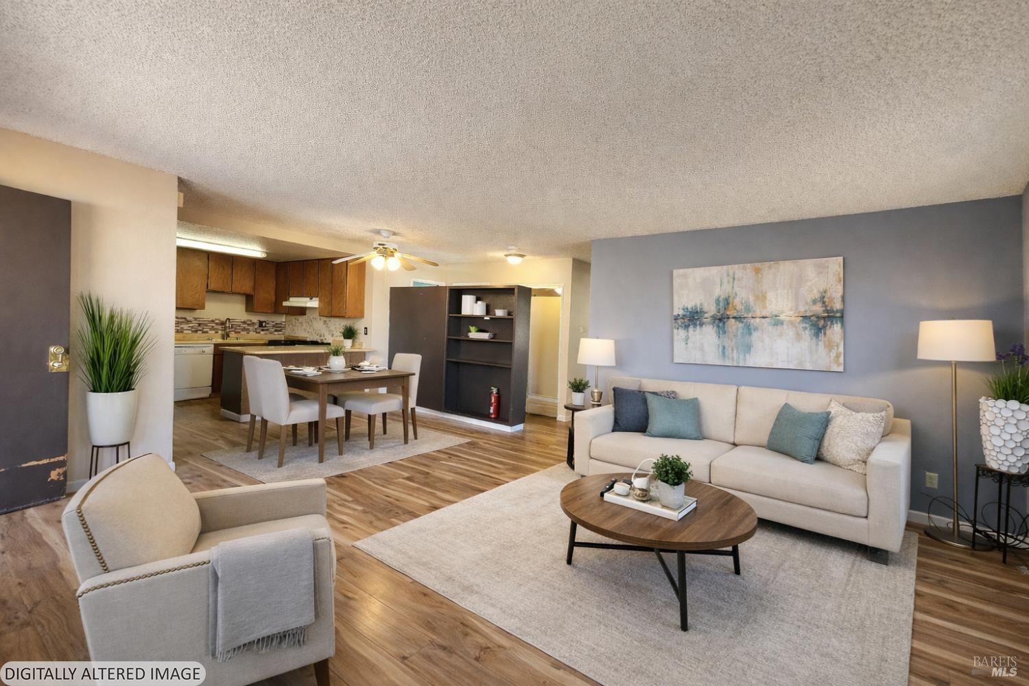 717 Blair Place Santa Rosa, CA 95401 - Photo 3 of 23 a living room with furniture and a table