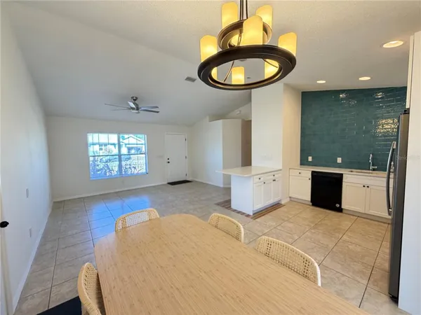 a view of a living room and bathroom