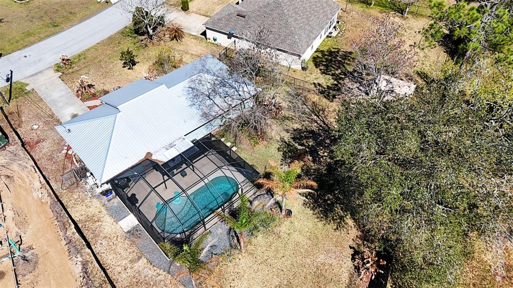 16 Powder Hill Lane Palm Coast, FL 32164 - Photo 15 of 27 an aerial view of a house with a yard